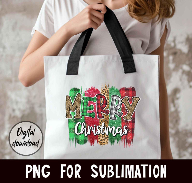 May include: White tote bag with black handles and a colorful "Merry Christmas" design featuring green, red, black, and white plaid patterns, leopard print, and glitter accents.