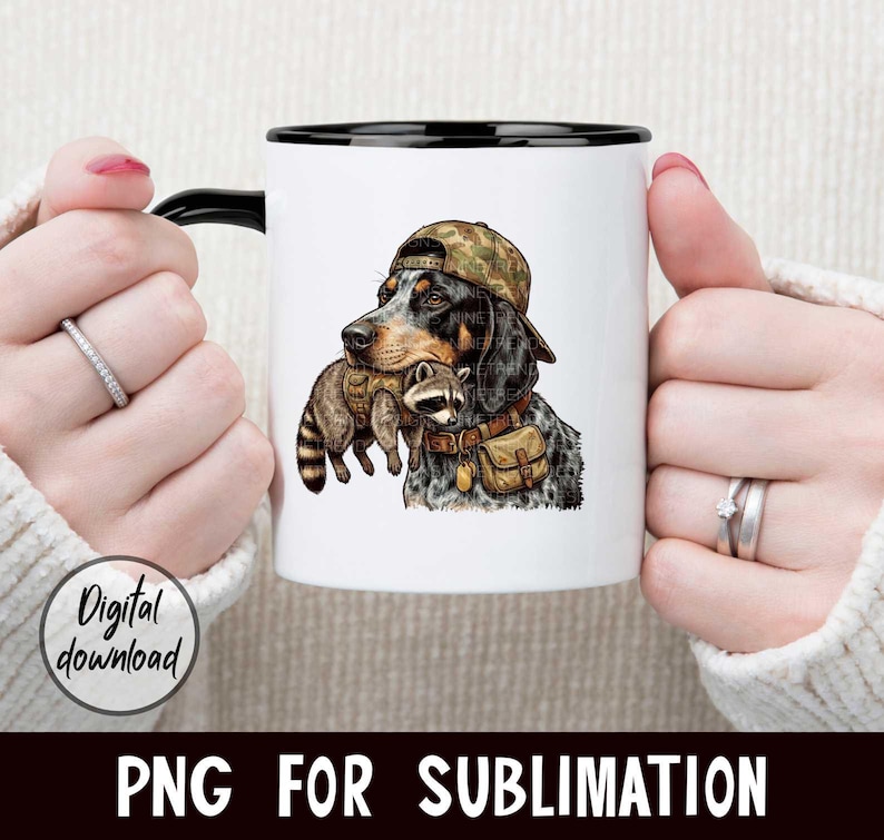 May include: White ceramic mug with a black handle and rim. The mug features a detailed illustration of a dog wearing a camouflage hat and carrying a raccoon. The words "Digital download" are on the left side of the mug. The words "PNG FOR SUBLIMATION" are at the bottom.