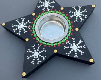 Portavelas de té navideño pintado a mano.