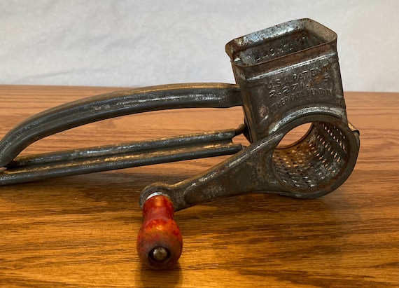 Vintage Mouli cheese grater made of steel with old wooden handle
