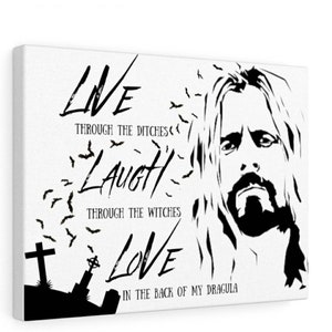 May include: Black and white illustration of a man with long hair and a beard. The text "LIVE THROUGH THE DITCHES LAUGH THROUGH THE WITCHES LOVE IN THE BACK OF MY DRAGULA" is written below the image.