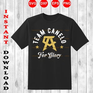 May include: A black t-shirt with a gold graphic design that says "Team Canelo" with a star on each side of the letter "A" and the words "For Glory" below.