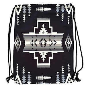 May include: Black drawstring bag with a geometric pattern in shades of gray and white. The pattern is reminiscent of Native American designs.