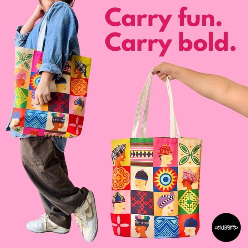 May include: Colorful tote bags with a patchwork design featuring geometric patterns and stylized human figures. The bags have white handles and the text "Carry fun. Carry bold."