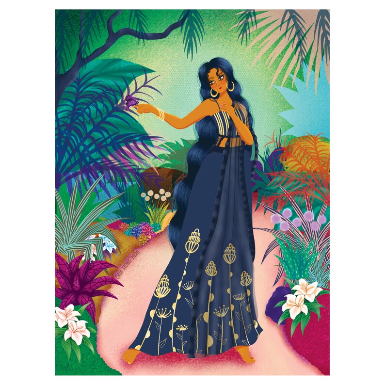 May include: A woman with long dark hair wearing a blue and gold patterned dress stands in a lush green garden. She is reaching out to touch a purple flower.