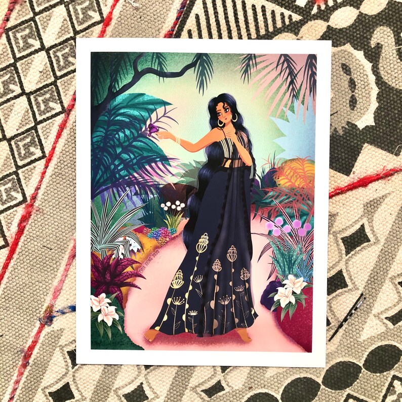 May include: A woman in a black dress with gold accents stands in a lush green jungle. She is holding a purple butterfly in her hand. The background is filled with tropical plants and flowers.