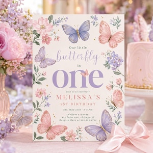 May include: A rectangular birthday invitation card featuring watercolour illustrations of pink and purple butterflies and flowers. The text reads: Our little butterfly is one, join us to celebrate Melissa's 1st birthday, Sat. May 15th, 3-6 PM, Melissa's House, 475 Farm ave, chicago, il, Rsvp to Kate at 235.123.6789.