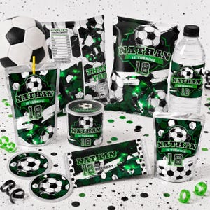 May include: A collection of soccer-themed party supplies, including a soccer ball, juice boxes, water bottles, chip bags, and candy bar wrappers. The items are decorated with a green and black soccer ball design and the text "Nathan is Turning 12" or "Nathan is Turning 18".