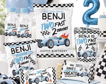 May include: A collection of party supplies with a racing theme. The items include water bottles, chip bags, juice pouches, and treat wrappers, all featuring a blue race car design and the text "Benji is Two Fast 2 Curious". Balloons and checkered flags complete the birthday party setup.