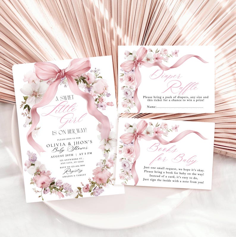 May include: Baby shower stationery set featuring a pink floral and ribbon design. The main invitation reads "A Sweet Little Girl Is On Her Way!" with event details. Additional cards include "Diaper Raffle" and "Books for Baby."