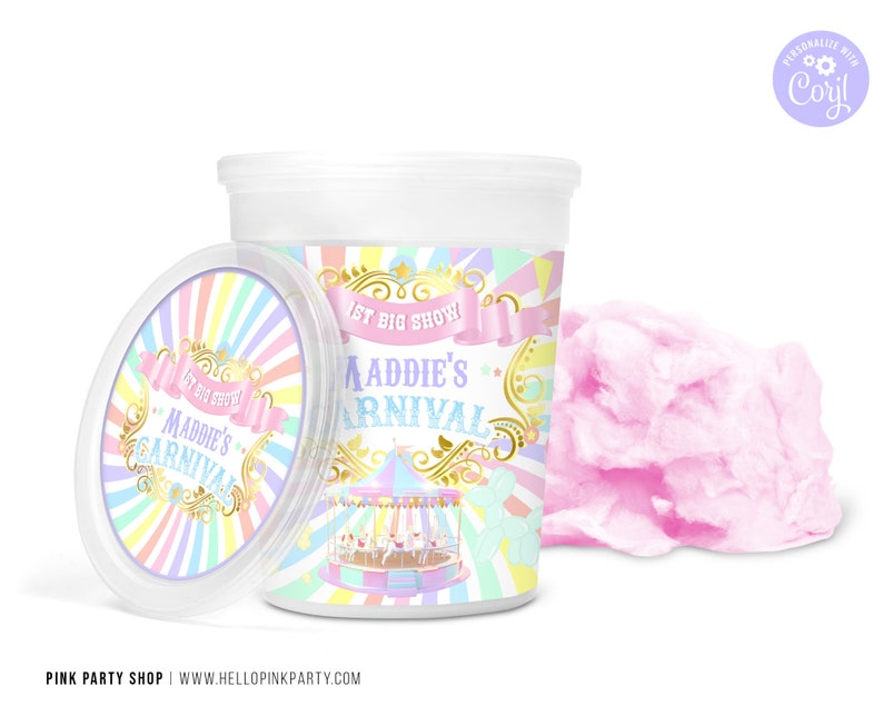 May include: A container of pink cotton candy with a lid featuring a carnival-themed design. The container is labeled "Maddie's Carnival" with a carousel illustration and pastel colors. A fluffy cloud of pink cotton candy sits beside it.