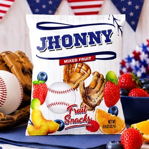 May include: A bag of "Jhonny" mixed fruit snacks with baseball and baseball glove graphics. The bag is surrounded by fresh fruit, a baseball, and patriotic bunting. Net weight is 0.8 oz (22.7g).