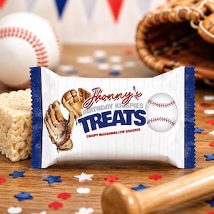 May include: A package of "Jhonny's Birthday Krispies Treats" crispy marshmallow squares with baseball-themed graphics. The design includes a baseball, a glove, and the text "Treats". Baseball, glove, and confetti are scattered on a wooden surface.