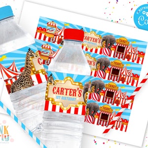 May include: Water bottle labels with a circus theme. The labels feature a red and white striped tent, a giraffe, an elephant, and the text "Carter's 1st Birthday".