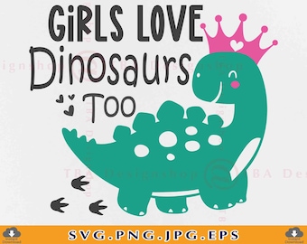 May include: Green dinosaur with a pink crown and the text "Girls Love Dinosaurs Too" in black. The dinosaur has white spots and is walking with three black footprints.