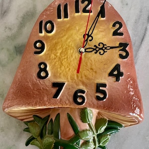 May include: A set of three ceramic mugs with a speckled, matte finish. The mugs are in shades of cream, light gray, and dark gray. Each mug has a simple, minimalist design, perfect for coffee or tea.