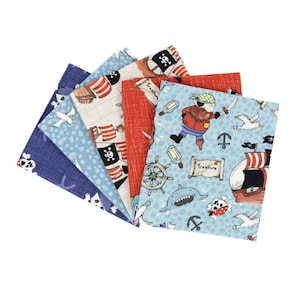 May include: A set of six fabric squares featuring a pirate theme. The squares are in shades of blue, red, and white and feature illustrations of pirates, ships, treasure, and sea creatures.