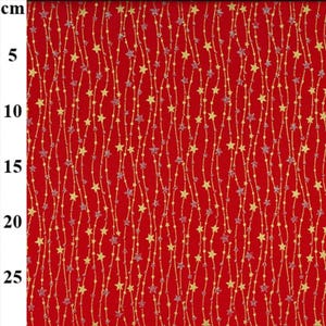 May include: Red fabric with a repeating pattern of gold and silver stars on thin, wavy gold lines. The stars vary in size and are evenly spaced across the fabric. The background is a solid, vibrant red.