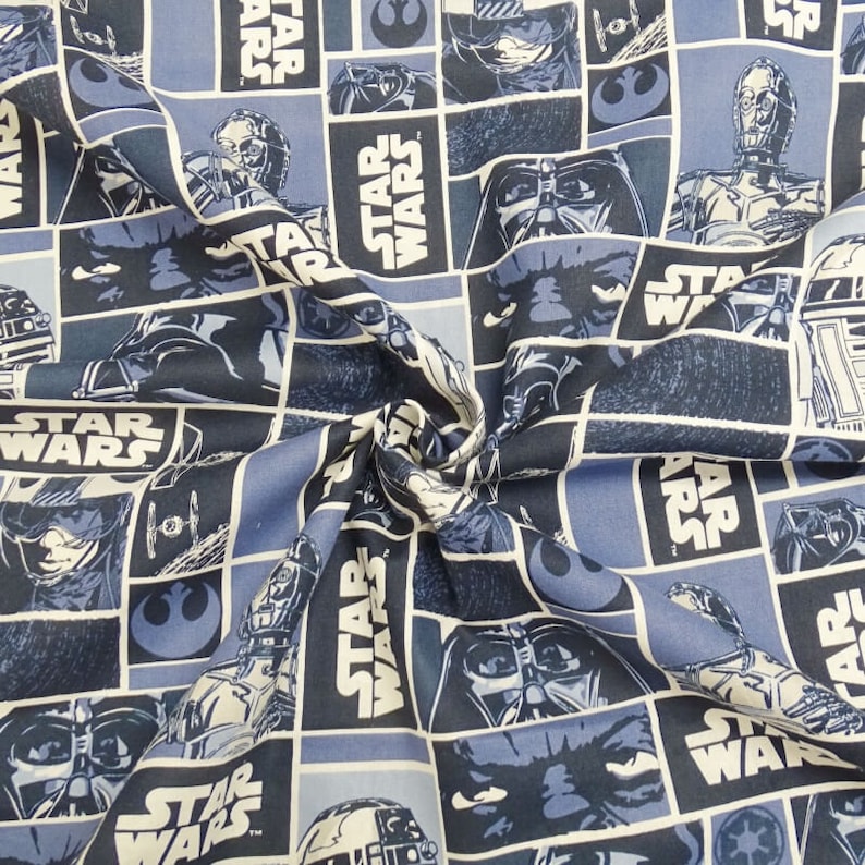 May include: Blue and white fabric with a repeating pattern of Star Wars characters and the words "Star Wars".
