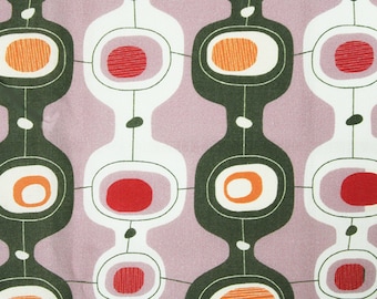 May include: Abstract pattern featuring repeating shapes in white, dark green, and orange, connected by thin lines. The design includes oval and circular elements on a light purple background, creating a retro, mid-century modern aesthetic.