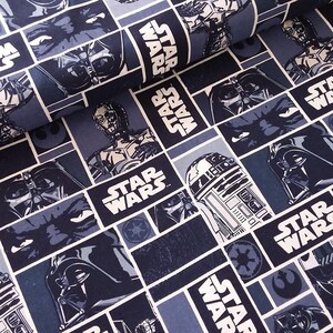 May include: A blue and black fabric with a repeating pattern of Star Wars characters and the Star Wars logo. The characters include Darth Vader, R2-D2, C-3PO, and the Rebel Alliance symbol.