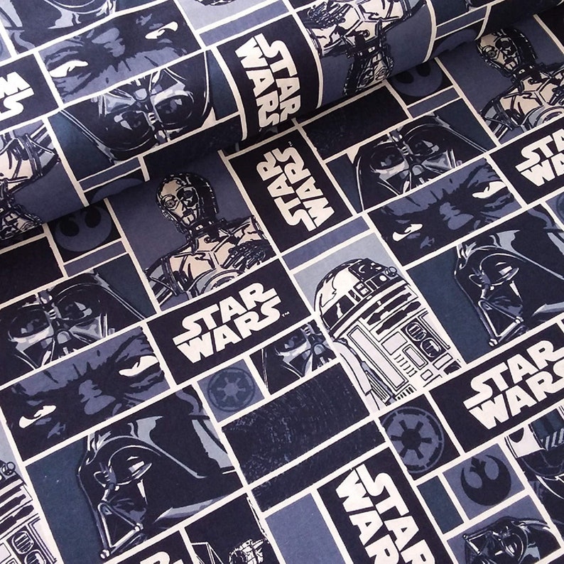 May include: A blue and black fabric with a repeating pattern of Star Wars characters and the Star Wars logo. The characters include Darth Vader, R2-D2, C-3PO, and the Rebel Alliance symbol.