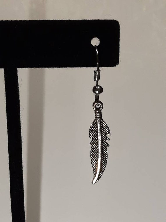 Feather earrings by Nastasyeu  NEW moon earrings in my ETSY shop  available httpswwwetsycomlisting637484396greenmoonfeather earringshalloween  Facebook