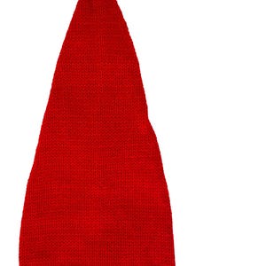 May include: A red knitted elf hat with a long tassel. The hat has a pointed top and a folded brim. The hat is made of a soft, warm material and is perfect for keeping your head warm during the winter months.