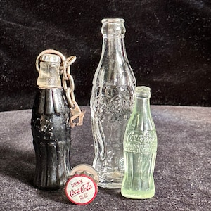Vintage Miniature Coke Coca-Cola Glass Bottle, Plastic Bottles and Metal Cap on stopper, Made in USA, 1960’s