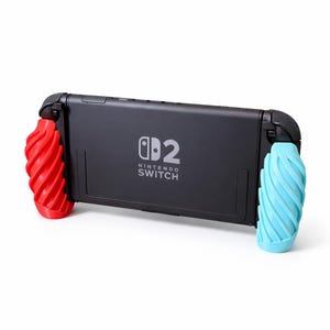 May include: A black Nintendo Switch console with red and light blue textured grips. The console has the Nintendo Switch logo printed on the back. The grips are designed for enhanced comfort and control during gameplay.