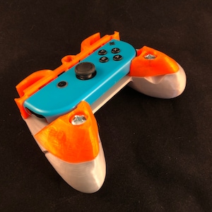 Bliss: Ergonomiczny, obciążony uchwyt Joy Con