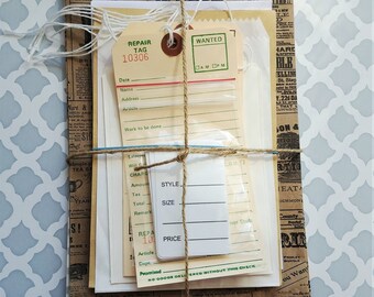 May include: A bundle of vintage paper ephemera, including a repair tag, a wanted poster, and a style and size tag. The bundle is tied together with twine and is wrapped in brown paper. The paper is printed with text and images.