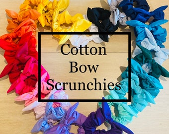 Beautiful handmade cotton bow scrunchies. 20 + colours available.