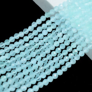 May include: A strand of light blue faceted gemstone beads. The beads are strung together and are ready to be used for jewelry making.