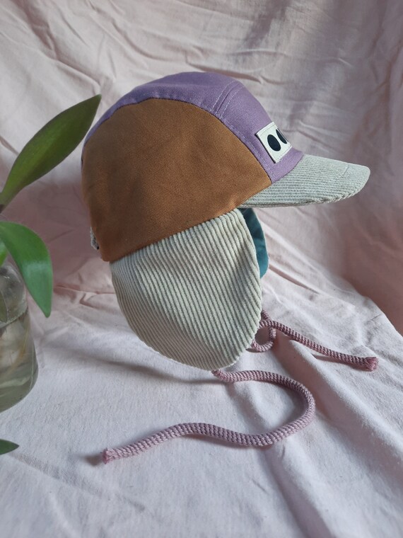 kappe mit ohrenschutz