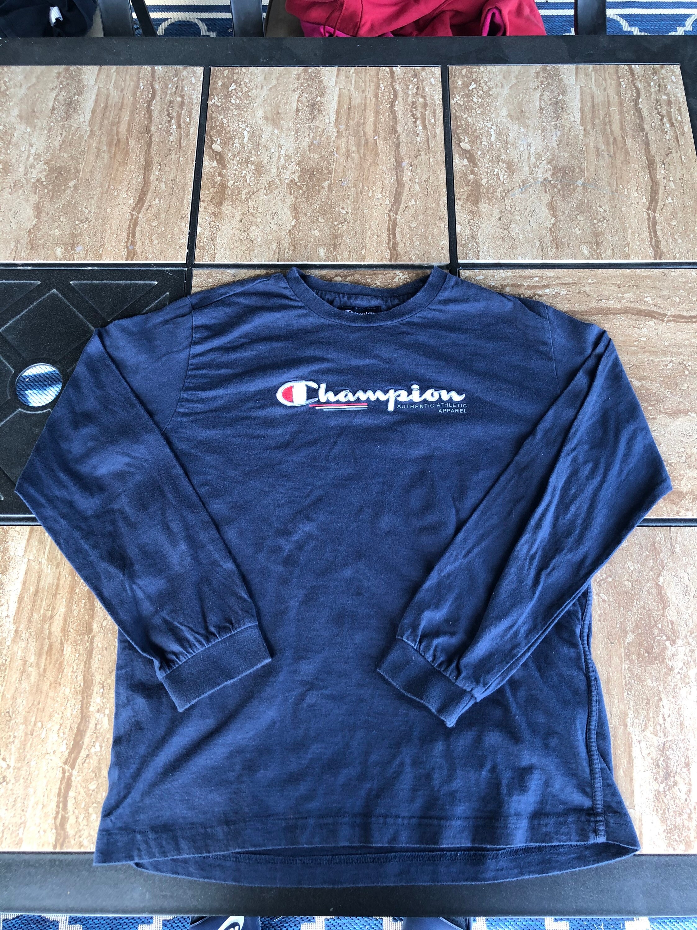 Buy > long sleeve blue champion shirt > in stock