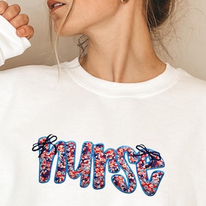 Coquette Nurse Embroidered Sweatshirt, Custom Nurse Sweatshirt, RN Sweatshirt, Nursing Sweatshirt, Graduation Gift for Nurse, Bow Sweatshirt