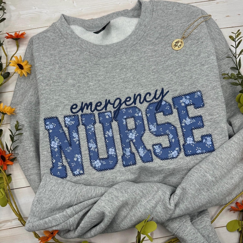 May include: A set of three ceramic mugs with a speckled, matte finish in cream, light grey, and dark grey. Each mug has a simple, minimalist design, suitable for coffee or tea.