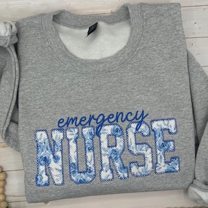 May include: A rustic wooden sign with the text "Welcome to our home" in a handwritten style. The sign has a distressed finish and a simple, inviting design, ideal for a front porch or entryway.