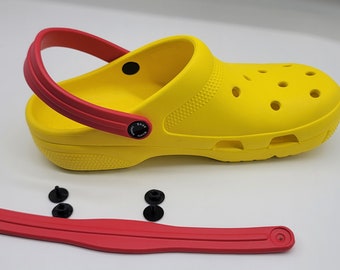 Snappy red straps for croc