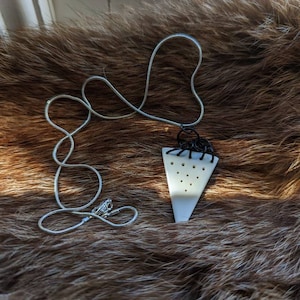 Polished cow bone necklace. Warrior pendant. Triangle bone. Chain links. Black. Bone jewelry. Bone jewellery. Tribal. Witch. Bovine. Bones.