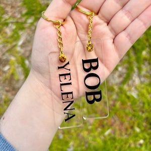 Yelena/bob/sentry/ and black  widow Keychain/Natasha romanoff/ Yelena belova keychain