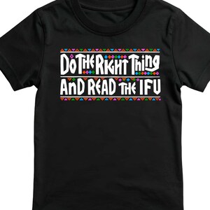 May include: Black t-shirt with the text "DO THE RIGHT THING AND READ THE IFU" in white, framed by colorful geometric patterns. The shirt is a short-sleeved crew neck.