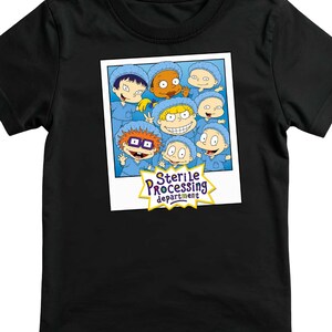May include: Black t-shirt featuring a cartoon image of several characters in blue scrubs and caps. The image is in a white frame and includes the text "Sterile Processing department".