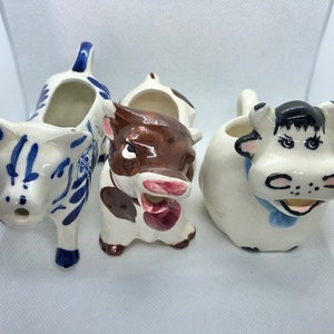 Three Small Vintage Cow Creamers