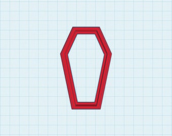 May include: A red, six-sided coffin-shaped cookie cutter with a thick, beveled frame. The object features a hollow center and a distinct, angular geometric outline, presented against a light blue grid background.