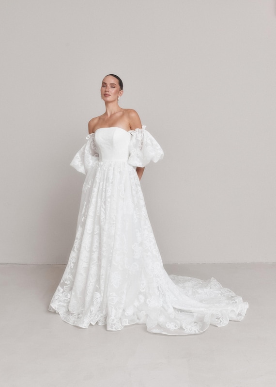 Annabelle Wedding Dress: Glitter Floral Organza Gown with Removable Sleeves Annabelle Wedding Dress: Glitter Floral Organza Gown with Removable Sleeves