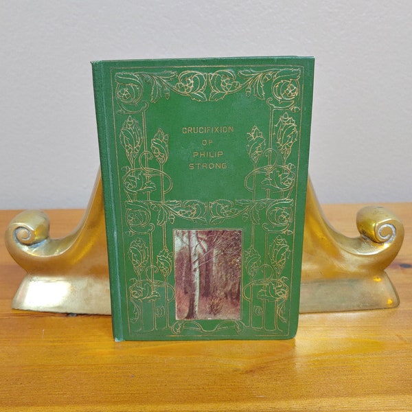 Antique green decorative book Crucifixion of Philip Strong, Charles M. Sheldon, Henry Artemus Company, early 1900's, Christian themed story