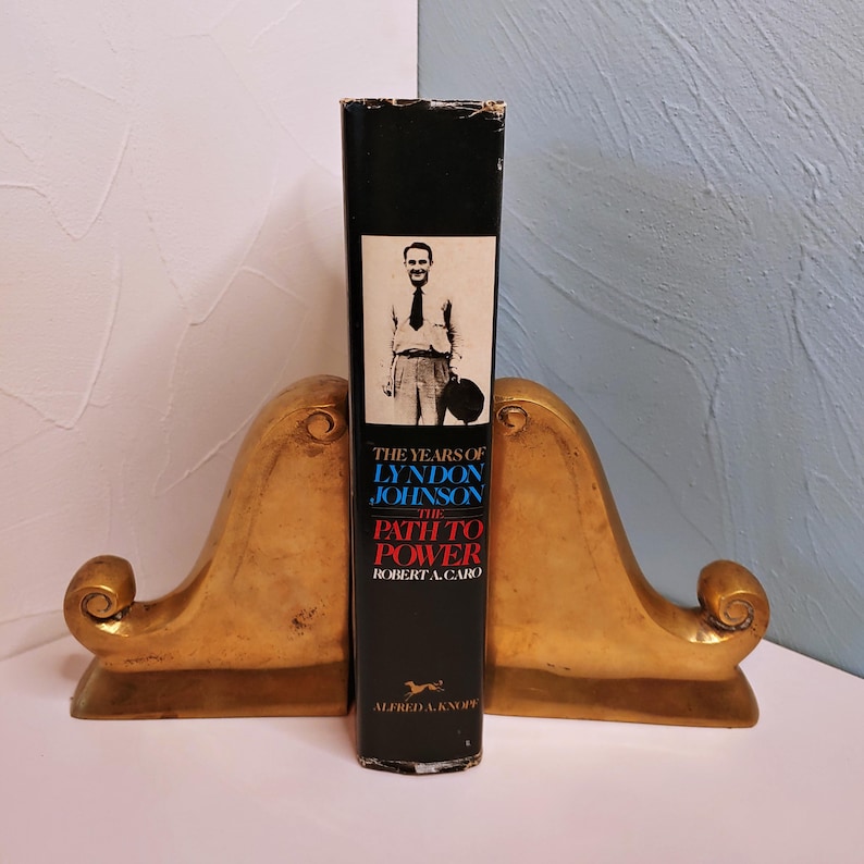 May include: A rustic wooden sign with the text "Welcome to our home" in white lettering. The sign features a distressed finish and a simple, inviting design, perfect for front door decor.