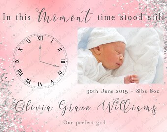 May include: A pink and white background with silver glitter. A clock face with Roman numerals shows the time stopped at the moment of birth. A photo of a sleeping baby is in the upper right corner. The text reads "In this moment time stood still" and "Olivia - Grace Williams Our perfect girl" with the date "30th June 2015 - 8lbs 6oz".